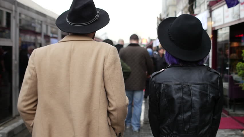 Couple in panama hats on the streets of Istanbul
