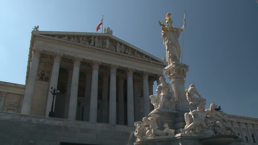 Statue of Pallas Athena Parliament Building Vienna Austria, named after the Greek goddess Pallas Athena - goddess of wisdom - who is portrayed with a colossal statue on top of a fluted column.