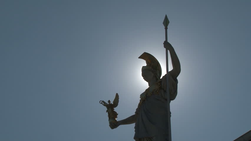 Statue of Pallas Athena Parliament Building Vienna Austria, named after the Greek goddess Pallas Athena - goddess of wisdom - who is portrayed with a colossal statue on top of a fluted column.