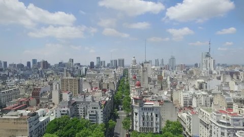 Buenos Aires Aerial Drone view. City Landscape. Travelling out of May Avenue. The Camera Goes Backwards. Cityscape, Towers, Trees And Buildings Background. Avenida de Mayo - Buenos Aires-Argentina