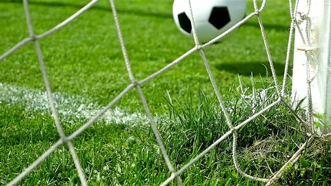 Slow motion of football soccer ball goal into net Video Stok