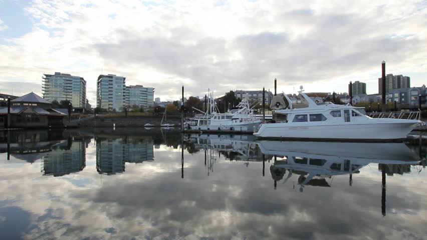 Waterfront Living along Willamette River in Portland Oregon with Water Reflection 1080p panning