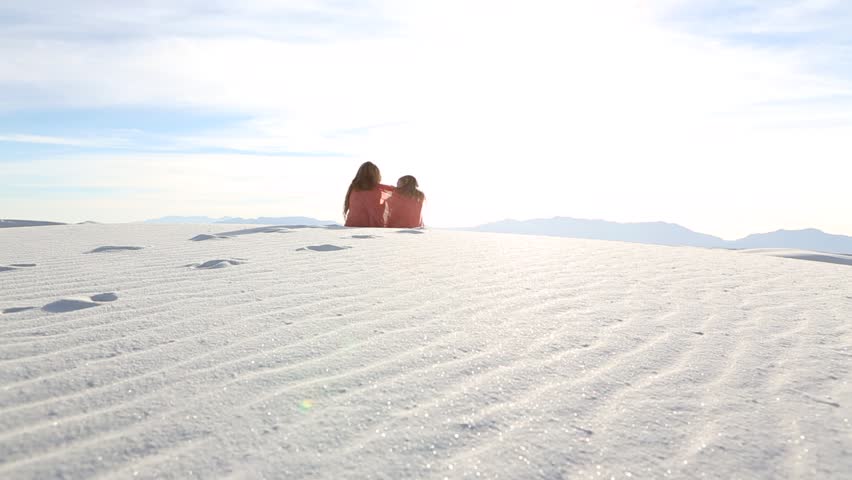 Family visits and plays in White Sands in New Mexico. White Sands, NM : February, 2016