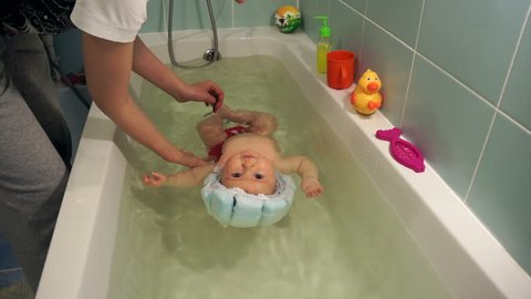 How often can you bathe a 4 month old baby Happy Smiling 4 Month Old Baby Stock Footage Video 100 Royalty Free 15837496 Shutterstock