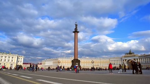 SAINT PETERSBURG, RUSSIA - APRIL 9: A tourist coach designed as a Cinderella carriage crosses Palace Square on April 9, 2016 in Saint Petersburg, Russia. Palace Square is a heart of old St Petersburg