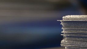 Metal coil stretching in order to produce metal tile in heavy industry  - Powered by Shutterstock - Get 15% off with code: PIKWIZARD15