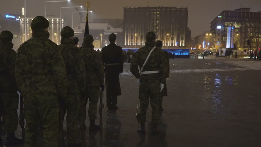 A military parade in the central park in Estonia where military men in uniform are getting ready