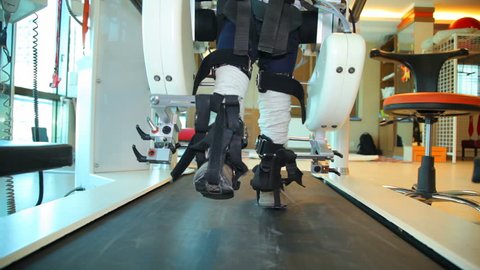 Medical robot. Medical walking robot LOKOMAT  - Stock Footage 