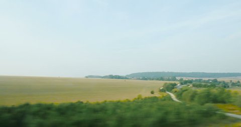View from the high speed train TGV at beautiful French landscapes