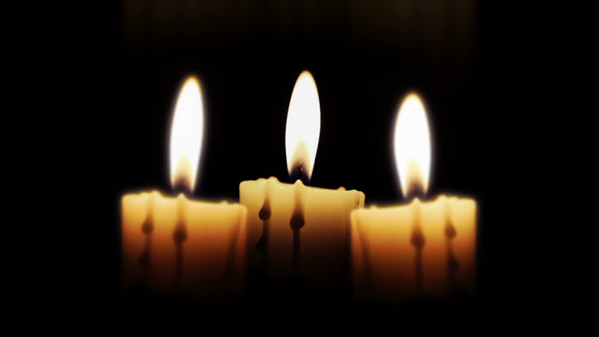 Candles in the night, close up, loop