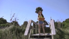Caucasian American USA beach picnic basket boardwalk denim shorts female selfie Hipster social media sunlight outdoor pretty redhead happy