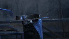Blacksmith Working with Hot Metal Rod. A great piece of stock in 4k definition, perfect for film, tv, documentaries, reality TV, trailers, infomercials and more!