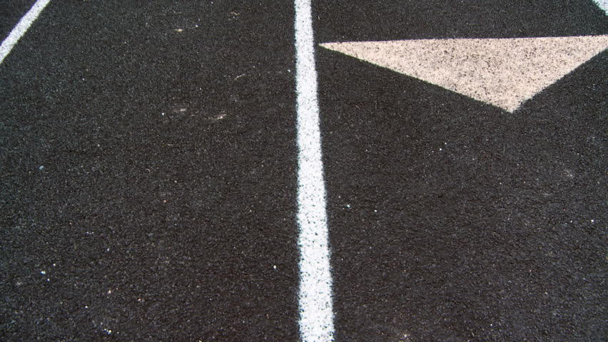 Pan up shot of lanes at race track. True 1080p.