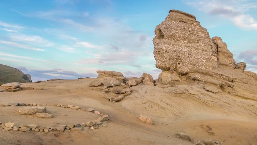 BUCEGI, ROMANIA - AUGUST 11, 2015: The Sphinx time lapse. The Sphinx is a natural rock formation in the Bucegi Natural Park which is in the Bucegi Mountains of Romania located at altitude 2,216 metres
