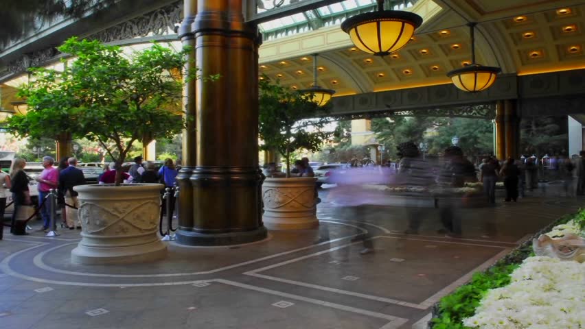 Pedestrians walking around a lobby (time-lapse)