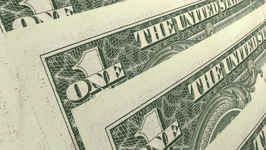 Macro of one dollarAmerican banknotes angled and diminishing, financial money