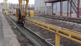 The big wheel of rail crane on the loading works - Powered by Shutterstock - Get 15% off with code: PIKWIZARD15