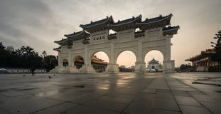 4K Time-lapse of early morning at the Archway of CKS (Chiang Kai Shek) Memorial Hall, Tapiei, Taiwan. The meaning of the Chinese text on the archway is 