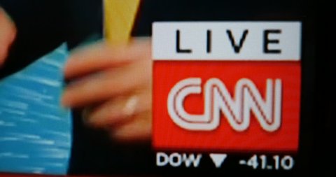 COPENHAGEN, DENMARK - CIRCA 2016: Digital Television running with the logo of the CNN Cable News Network channel and tv show behind