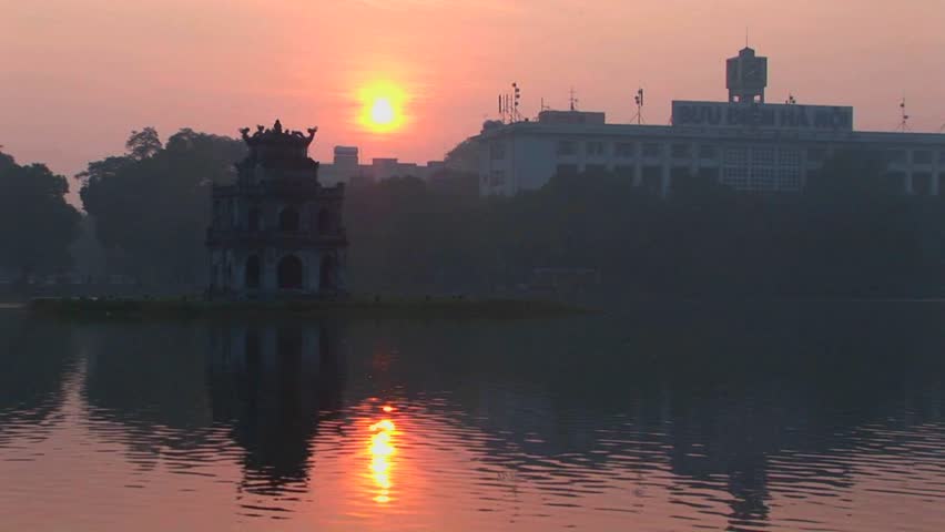 The sun sets behind Hanoi, Vietnam