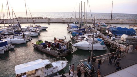 Summer 2015. Israel, Jaffo . Editorial
Divers on boat making dangerous parking in port Jaffa 02. Editorial