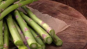 Rotating green Asparagus as 4K, not loopable footage