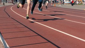 athletes athletics running around the stadium. competition for speed - start finish runners, lifestyle - sport. runners warm up before the race. Running speed - on the track. sport lifestyle. - Powered by Shutterstock - Get 15% off with code: PIKWIZARD15