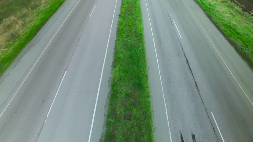 Flying over the road in early spring. aerial survey 4k | Shutterstock HD Video #15938347