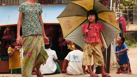 February 26 2016 Yangon, Myanmar. Group of children motion.Poverty is a major problem in Burma but children looks happy everywhere. 