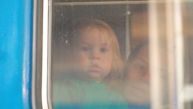 video child in the train window