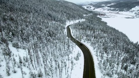 Lonely Highway Vehicle. Aerial/Drone Footage of a Blizzard Aftermath near Breckenridge. Colorado Rocky Mountains