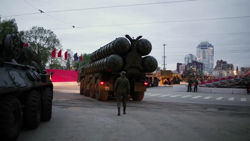 Anti-aircraft missile systems C-300 and armored vehicles are turning through streets of Samara on military celebration.