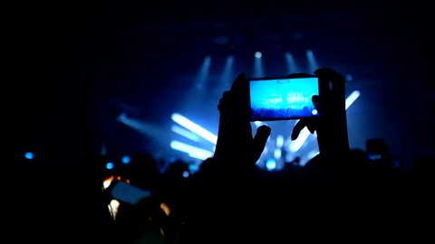 
00:02 | 00:22
1Ã?

Fans waving their hands and hold the phone with digital displays the crowd at a rock concert.Here is footage of people crowd partying at a concert or a night club.