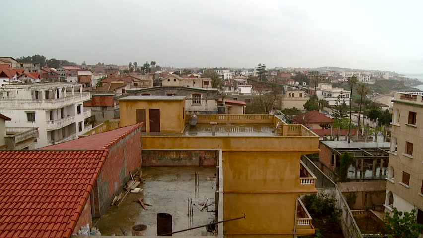 Panning long shot of Algiers cityscape and buildings
