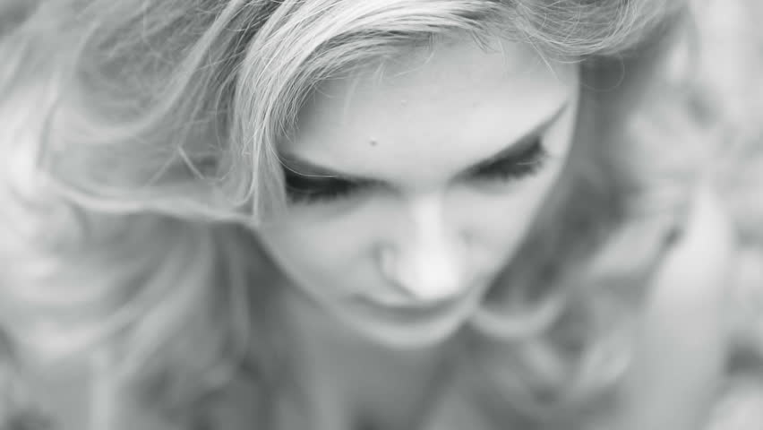 Blonde woman in the forest black and white face portait