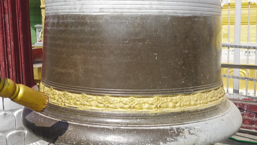 beats in Buddhist ritual bell, in Bagan, Myanmar (Burma) 4k