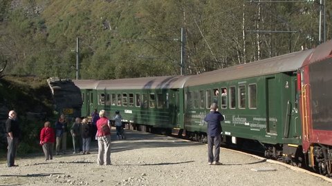 FLAM/NORWAY - 4TH SEPTEMBER 2010: The Flam train pulls out of a scenic station on the Flam railway in the Fords of Norway