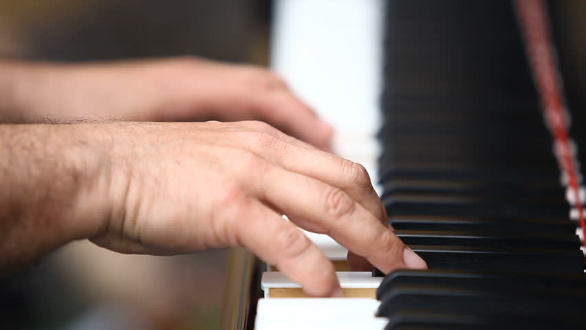 Playing the piano | Shutterstock HD Video #1604824