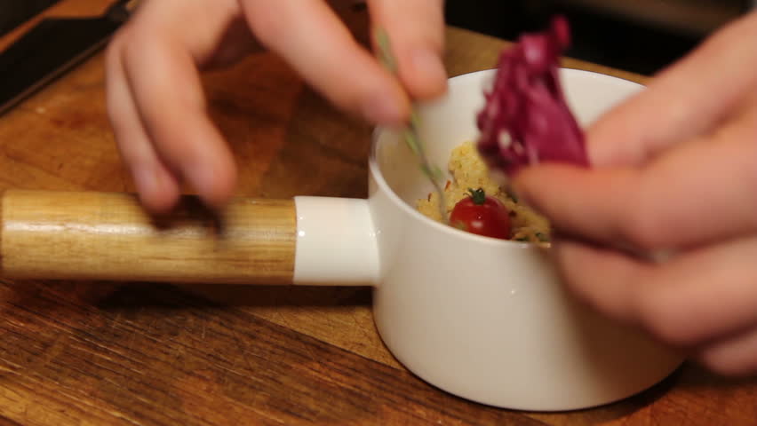 preparing vegeterian dish couscous 