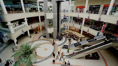 Abu Dhabi, UAE-Jan 28,2016: Aerial view of the customers wander at the shopping mall in Abu Dhabi, UAE
