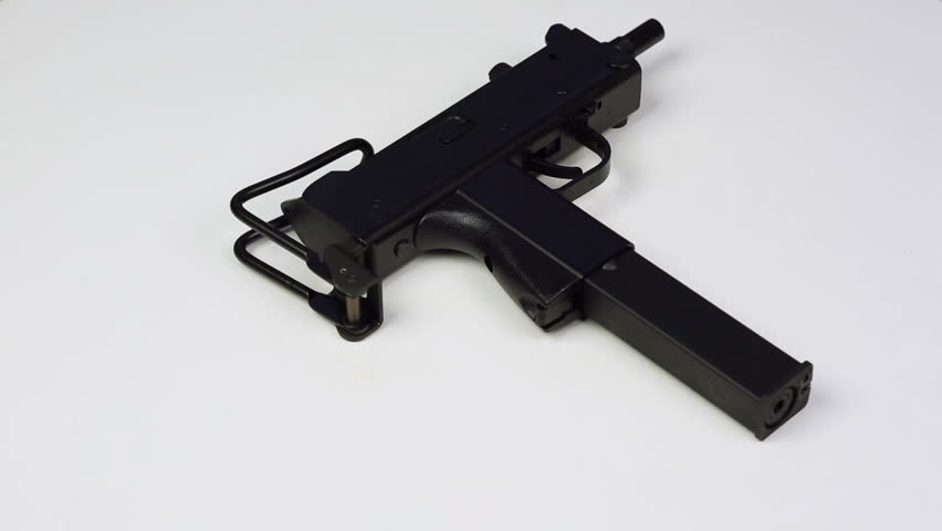 Submachine gun on white background