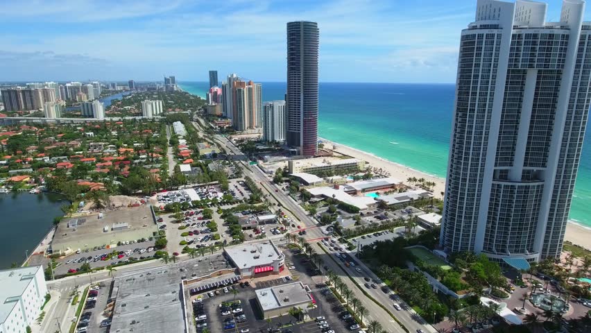 Skyscrapers on the beach aerial drone video Royalty-Free Stock Footage #16076839