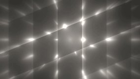 Abstract Silver Background With Rays Sparkles. Animation silver background with lens flare rays in background sky and stars. Seamless loop.