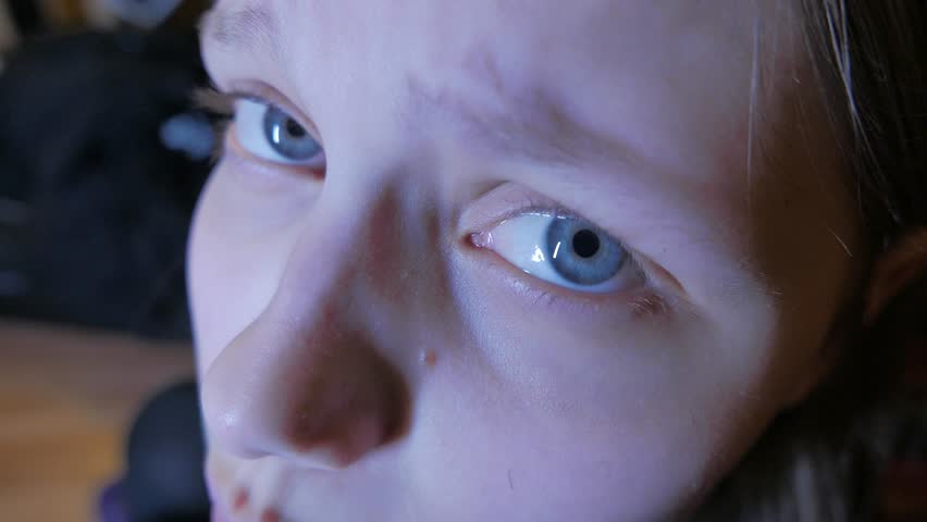 Closeup of a face of unhappy teen girl. 4K UHD. | Shutterstock HD Video #16082464