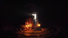 Candles shed light on a sacred altar within the ancient. sculpted. stone walls of Bayon Temple. an important historical site in Cambodia. FullHD 1080p footage