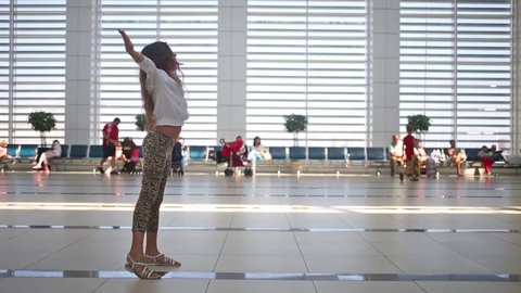 Little girl met her mother in airport with open arms