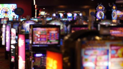 A shot of out of focus lights from a slot machines in a casino