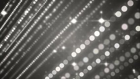Lights silver bokeh background. Elegant grey abstract. Disco background with circles and stars. Christmas Animated background. loop able abstract background circles.