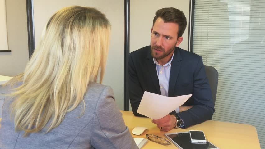 Young attractive woman during job interview