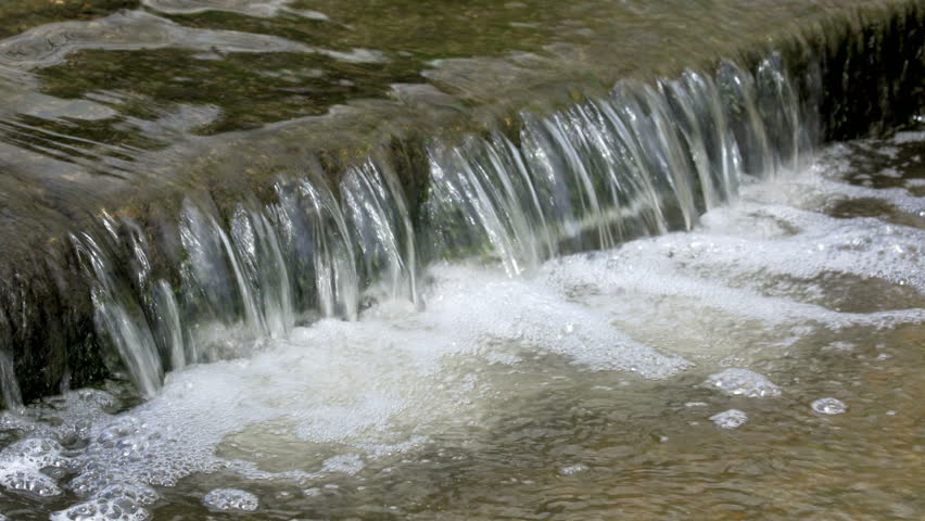 Small waterfall on a fast running stream, creek, or brook